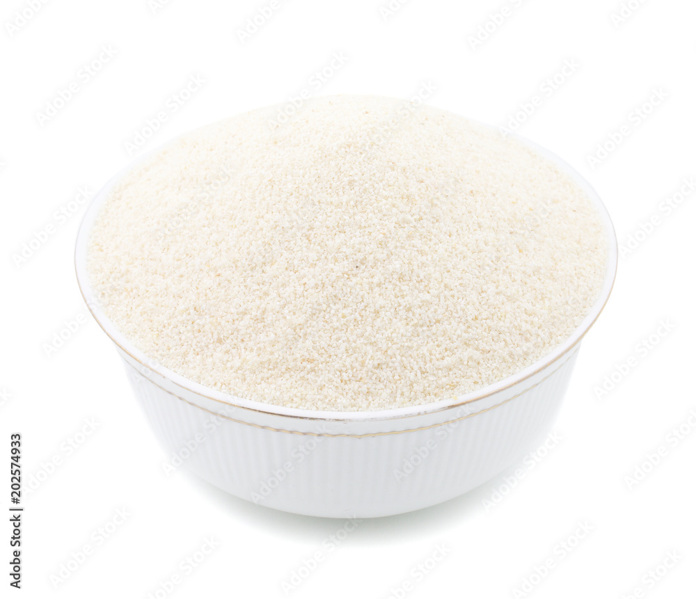 Raw Unprepared Semolina Flour or Suji in Bowl Isolated on White Background Raw Unprepared Semolina Flour or Suji in Bowl Isolated on White Background