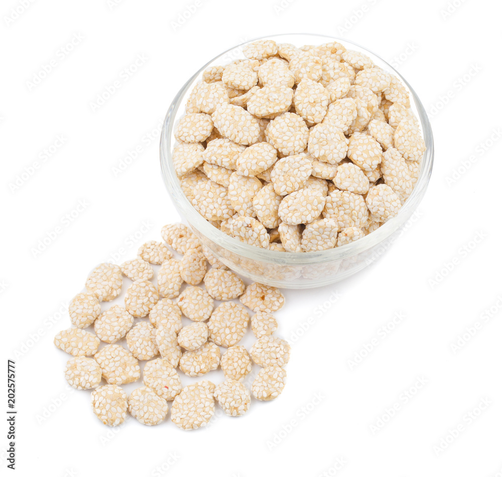 Indian Sweet Food Rewri also know as rewadi are popular in the Indian makar sankranti festival, Rewri is crisp toffee like dessert made from gudh (with spices) with coating of sesame seeds. Indian Sweet Food Rewri also know as rewadi are popular in the Indian makar sankranti festival, Rewri is crisp toffee like dessert made from gudh (with spices) with coating of sesame seeds.