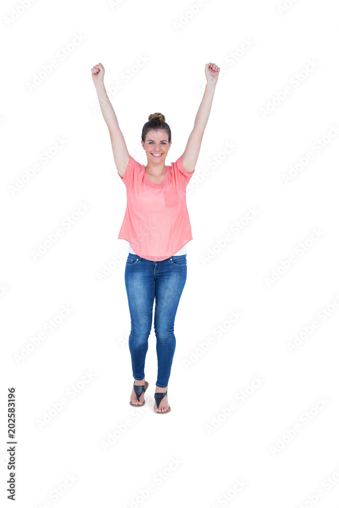 Happy pretty casual brunette cheering in front of camera Happy pretty casual brunette cheering in front of camera