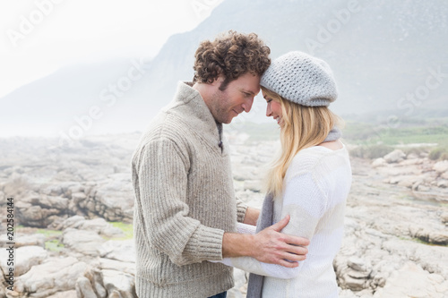 Romantic couple standing on a rocky landscape © WavebreakmediaMicro