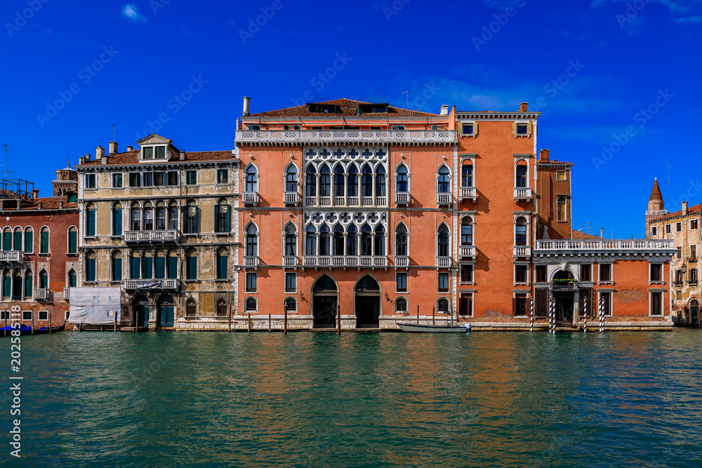 Venetian Gothic architecture building facade along the Grand Canal in Venice Italy