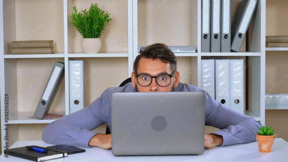 handsome business man have in modern office, employer looking at the camera with happy friendly smile handsome business man have in modern office, employer looking at the camera with happy friendly smile