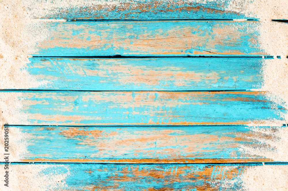 Beach background - top view of beach sand on old wood plank in blue sea paint background. summer vacation concept. vintage color tone. - obrazy, fototapety, plakaty 