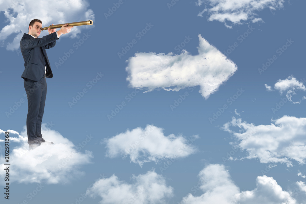 Businessman looking through telescope against cloud arrow Businessman looking through telescope against cloud arrow