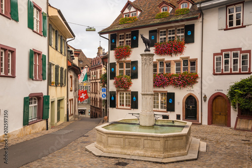 Gemsberg fountain and colourful buildings in the old town of Basel, Switzerland