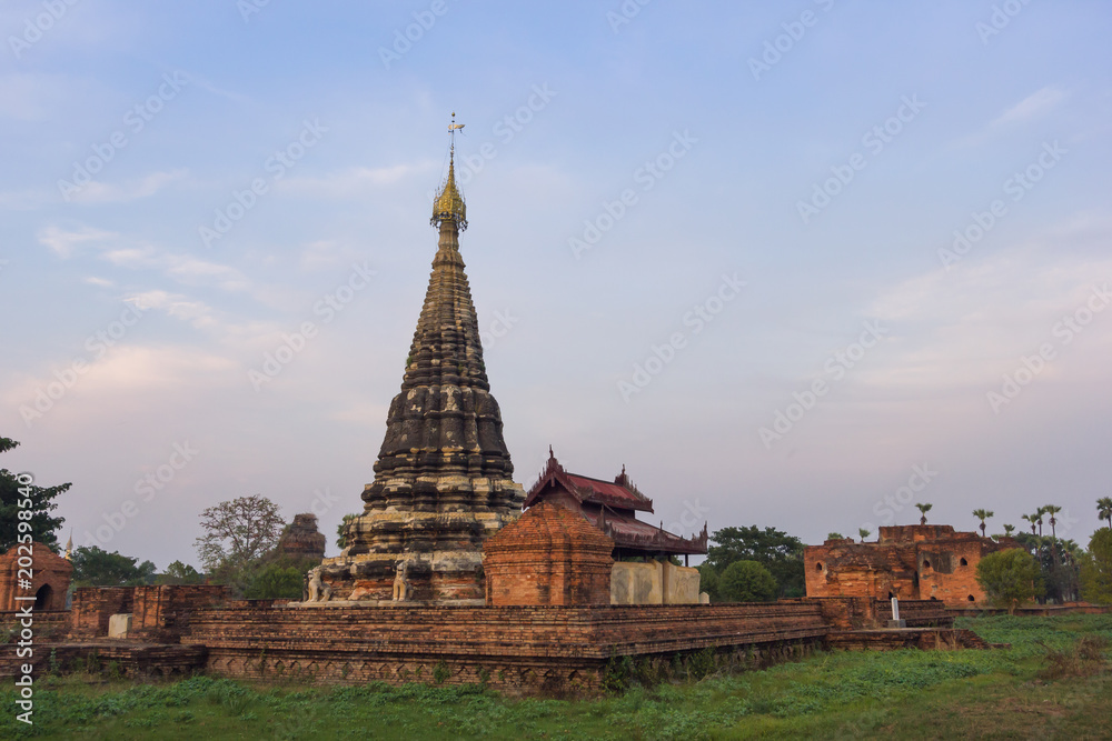 Fototapeta premium Ancient Pagoda (Lawka Dawtha Man Aung) at Inn Wa township (Ancient township between 14th and 19th century), Mandalay, Myanmar