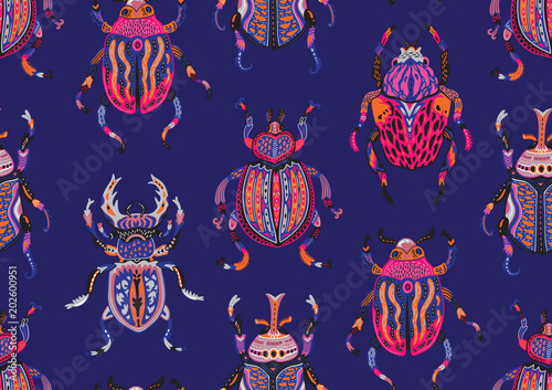 Seamless pattern with decorative ornamental beetles. Fantasy vector illustration