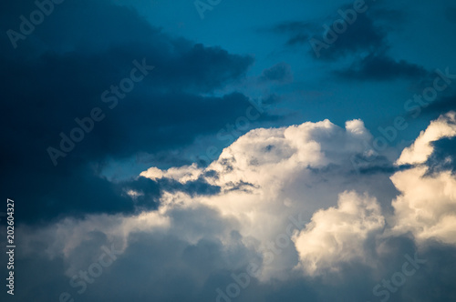 dark clouds in bad weather with sunshine © Oleg_Yakovlev