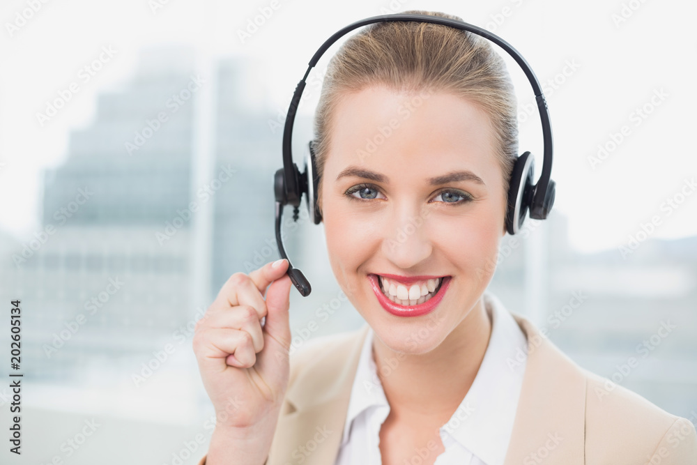 Cheerful pretty agent dealing with customer Cheerful pretty agent dealing with customer