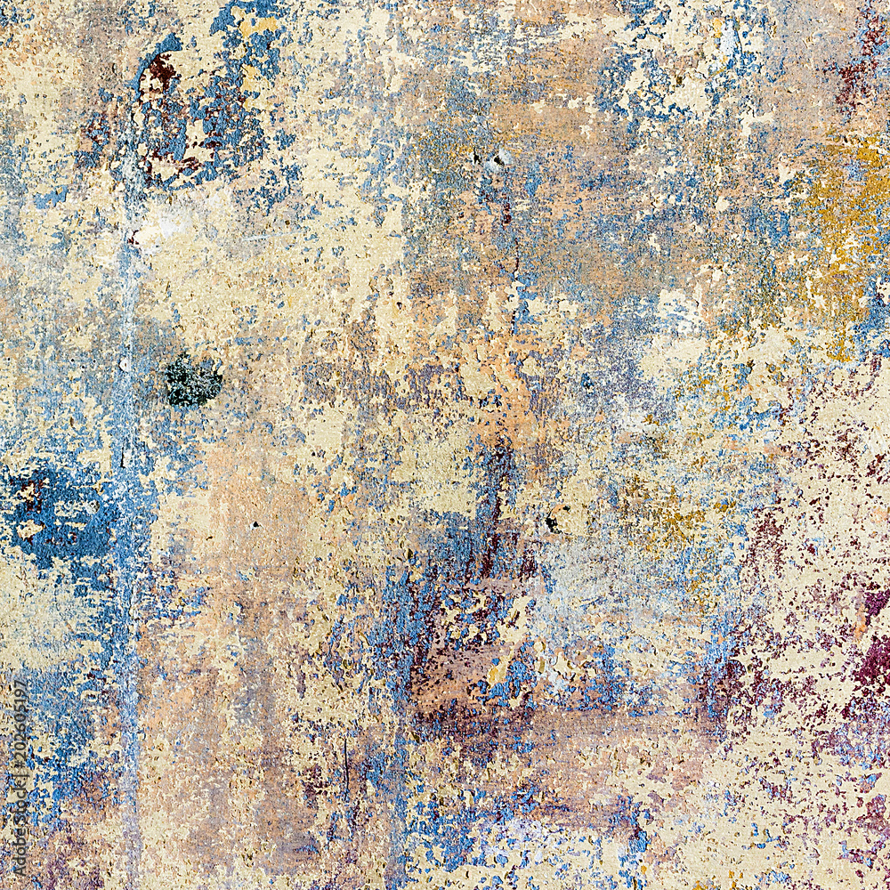 Fototapeta premium grunge wall of an old house with remainings of color