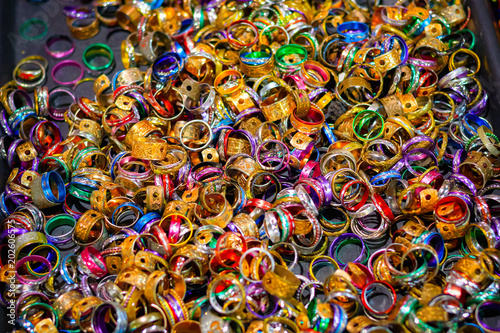 Colourful metal rings on display at Camden market in London