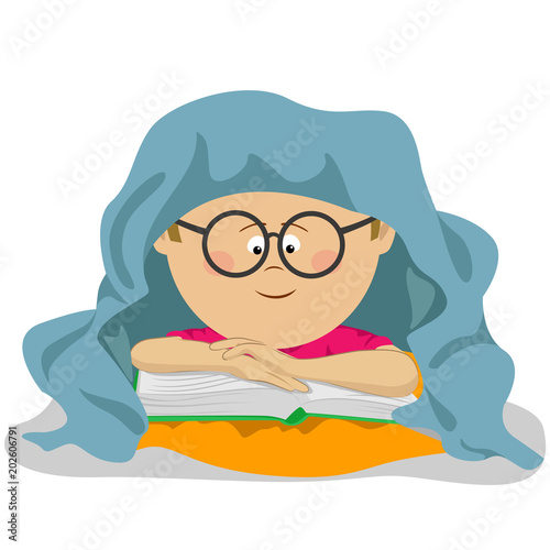 Nerd smiling boy lies in bed under a blanket reading an interesting book.