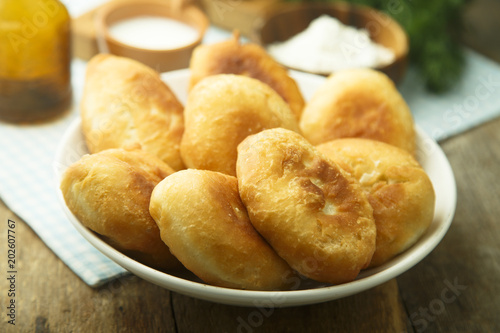 Homemade traditional fried Russian hand pies © marysckin