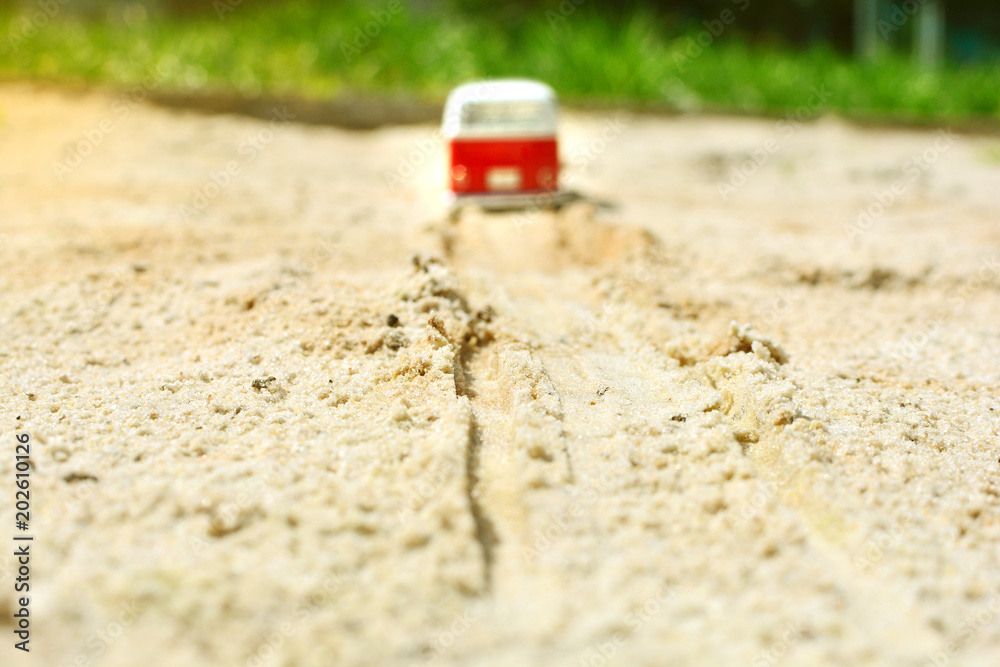 Travel background. Red bus trip to sea. The bus rides along the track. Travel background. Red bus trip to sea. The bus rides along the track.
