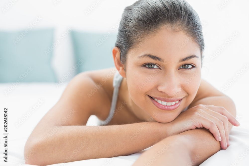 Close up portrait of a pretty woman lying in bed Close up portrait of a pretty woman lying in bed