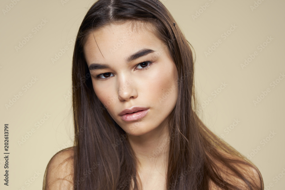 woman with dark hair of Korean appearance woman with dark hair of Korean appearance