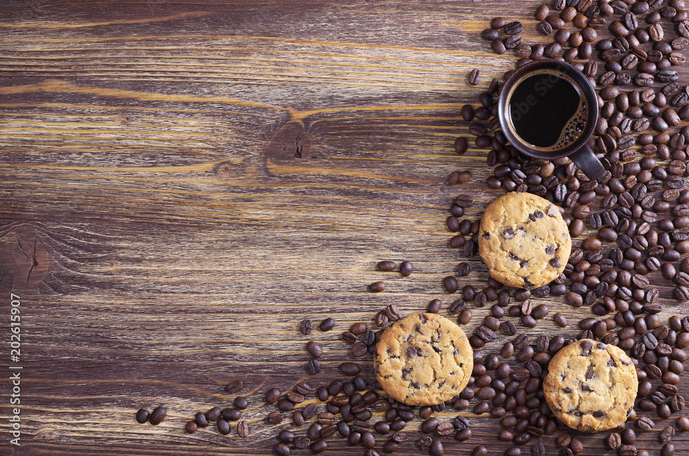 Cup of coffee, beans and cookies Cup of coffee, beans and cookies
