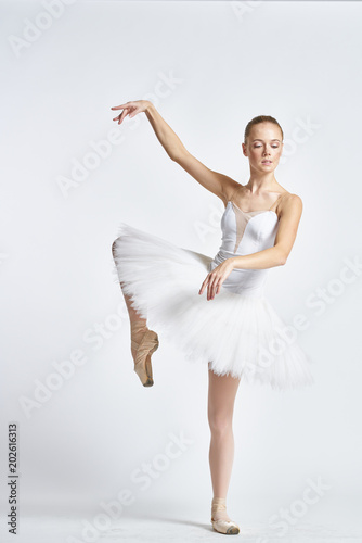 ballerina is standing on the socks pointe shoes