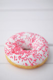 Donuts with icing on whiote background. Sweet donuts