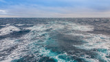 Seascape. The excitement of the water from the ship on the surface of the ocean