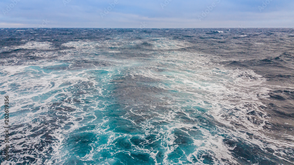 Seascape. The perturbation of the water from the sea vessel to the sea surface