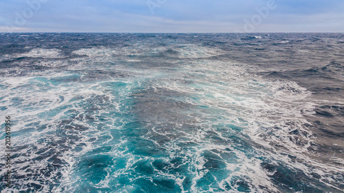 Seascape. The perturbation of the water from the sea vessel to the sea surface