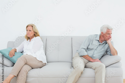 Displeased relaxed senior couple at home © WavebreakmediaMicro