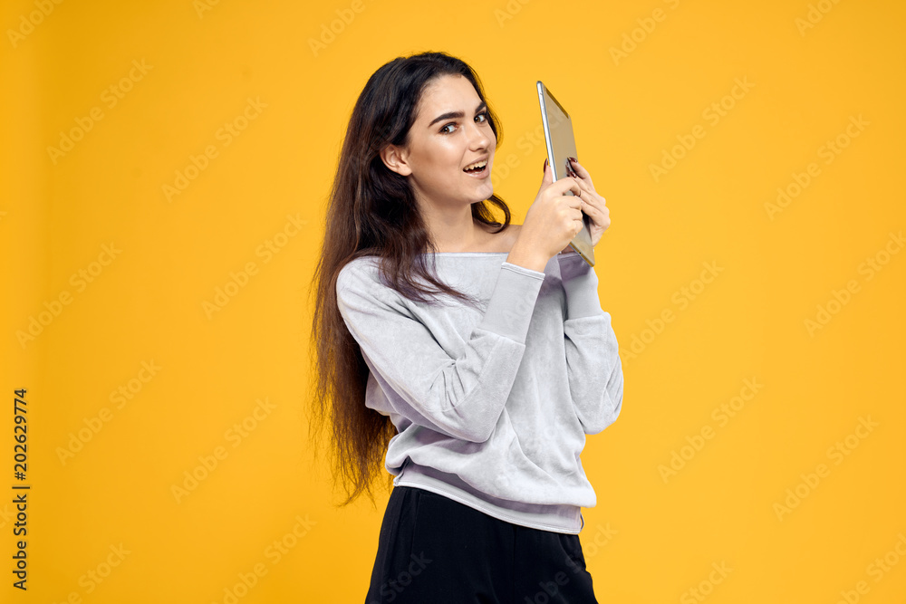 young woman pointing at something young woman pointing at something
