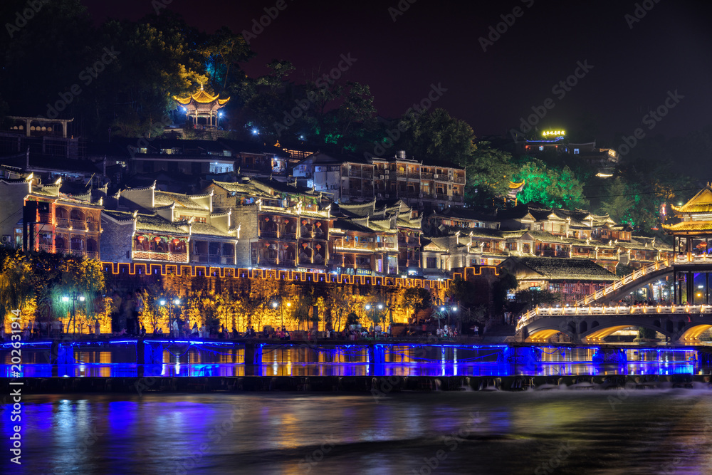 Night view of Phoenix Ancient Town and the Tuojiang River