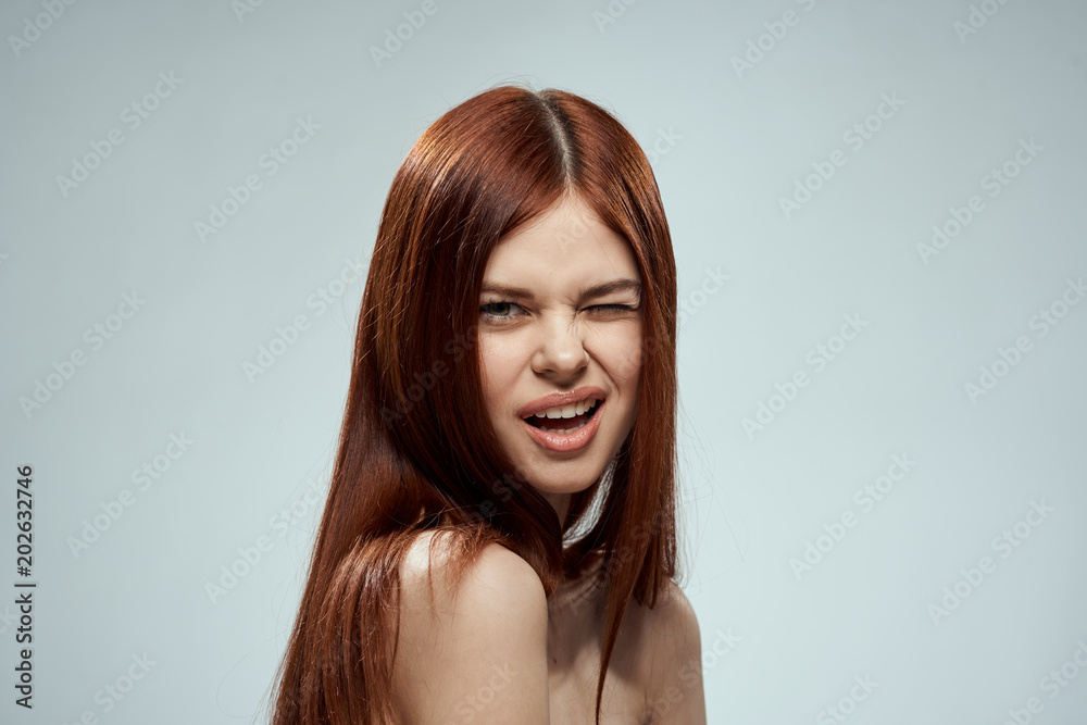 Naklejka premium portrait of young woman with long hair