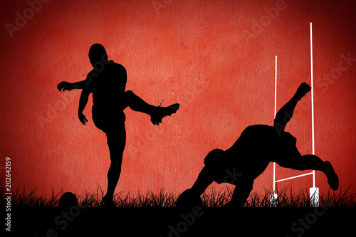 Photography Silhouette of rugby player against red background
