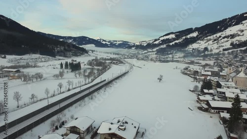 Aerial view of a railway and houses in Kitzb√ºhel photo