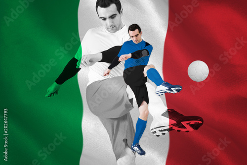 Football player in blue kicking against digitally generated italian national flag