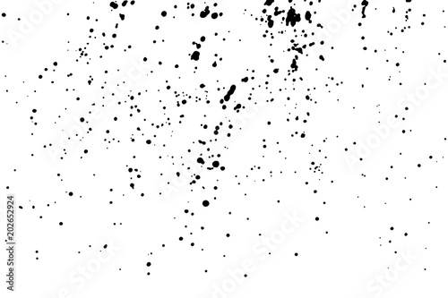 Grainy grunge abstract texture on transparent background. Paint spray, drop. Splatter of calligraphy ink in black. Black ink blow explosion on transparent background.