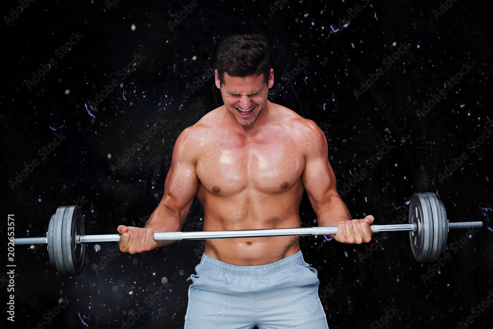 Bodybuilder lifting barbell against black background