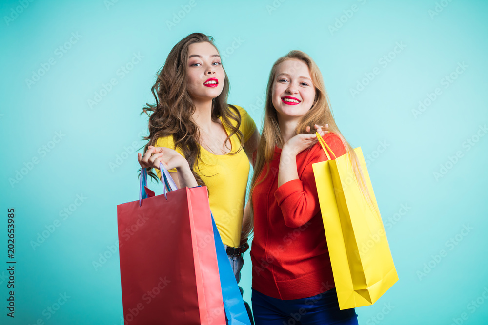 Woman in shopping. Happy woman with shopping bags enjoying in shopping