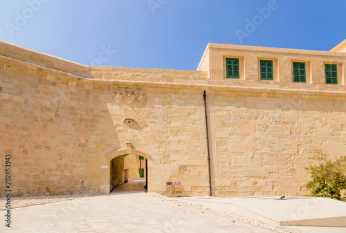 Valletta, Malta. The gates, decorated with bas-reliefs, at the Fort St. Elmo photo