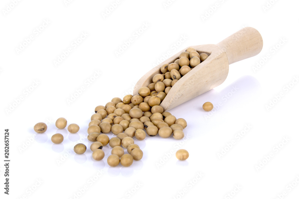 Soybean in wooden spoon isolated on white background