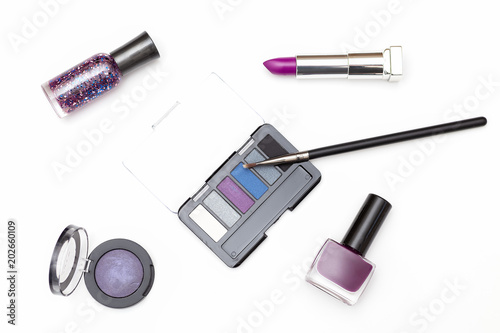 Cosmetic set of violet on white background. Flat lay