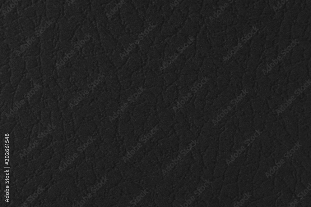 Fotografie Black paper texture with embossing and stamping