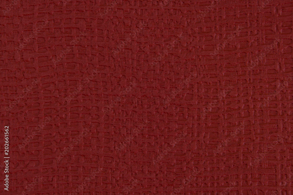 Fototapeta premium Burgundy paper texture with embossing and stamping