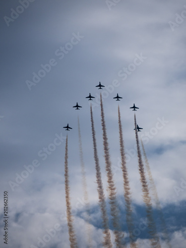 Airplanes in formation during an airshow