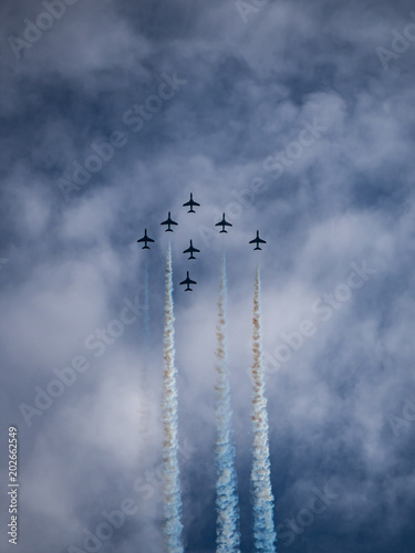 Airplanes in formation during an airshow