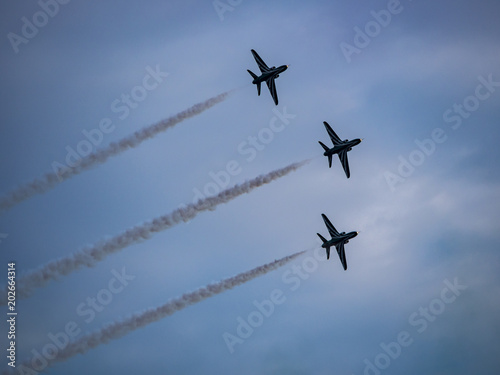 Airplanes in formation during an airshow
