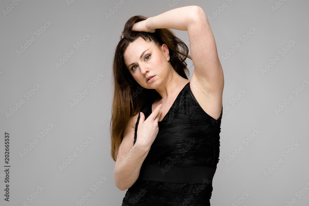 Attractive overweight woman in fashionable clothes Attractive overweight woman in fashionable clothes