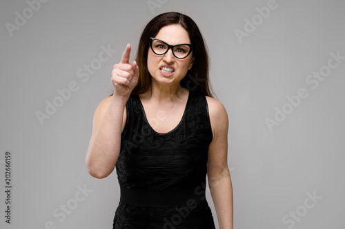 Attractive overweight woman in eyeglasses