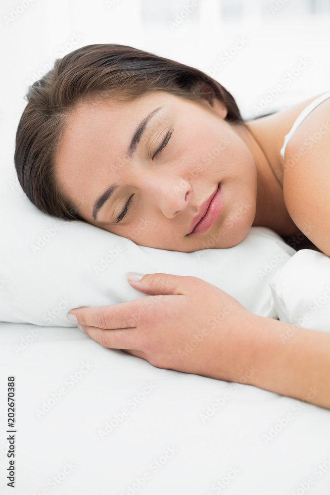 Beautiful woman sleeping in bed with eyes closed Beautiful woman sleeping in bed with eyes closed