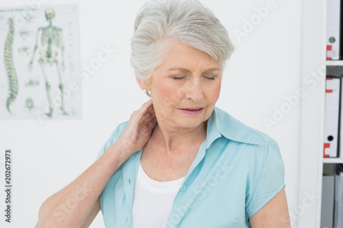 Senior woman suffering from neck pain