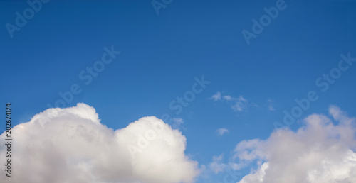 clouds on the edges and blue sky
