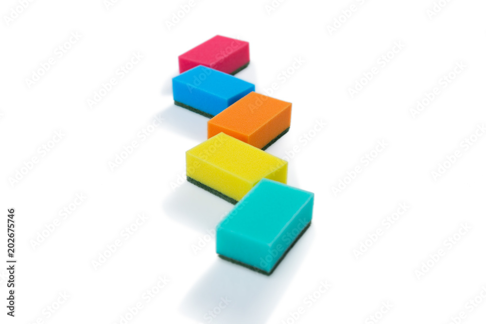 Colorful sponges against white backgroud